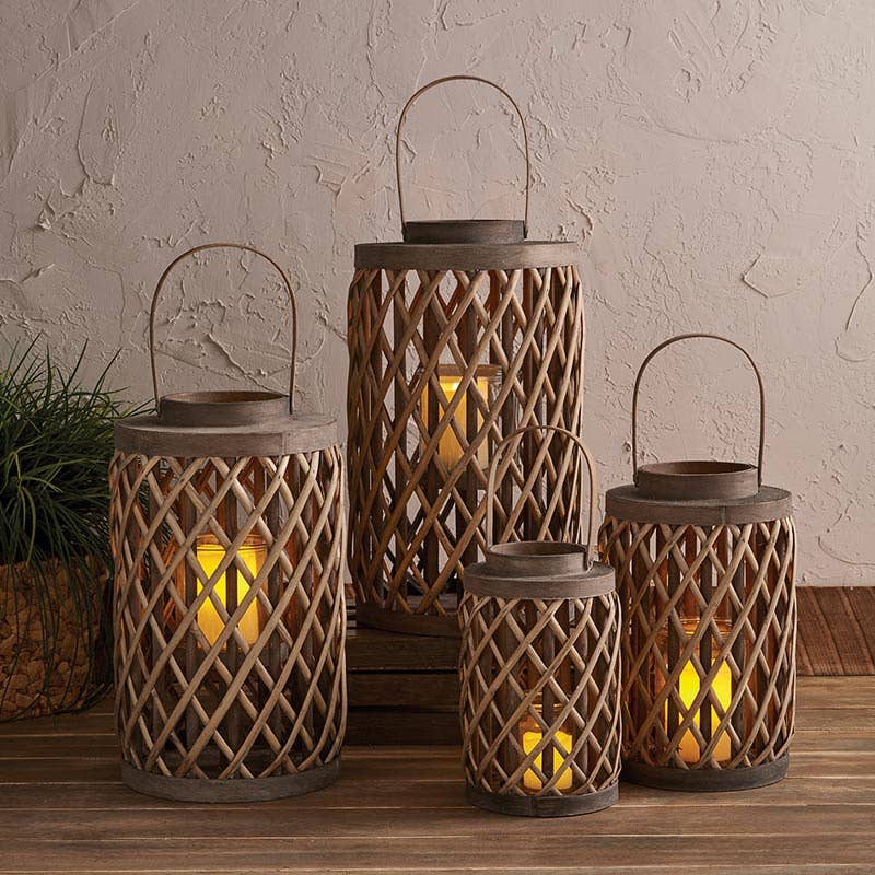 Gyuri extra large wood lanterns sitting on a table in a lifestyle image