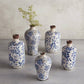 Multiple blue and white floral vases on a gray countertop- home accessories by Hugo George Home